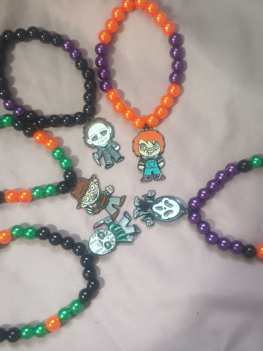 5 Halloween bracelets with different characters